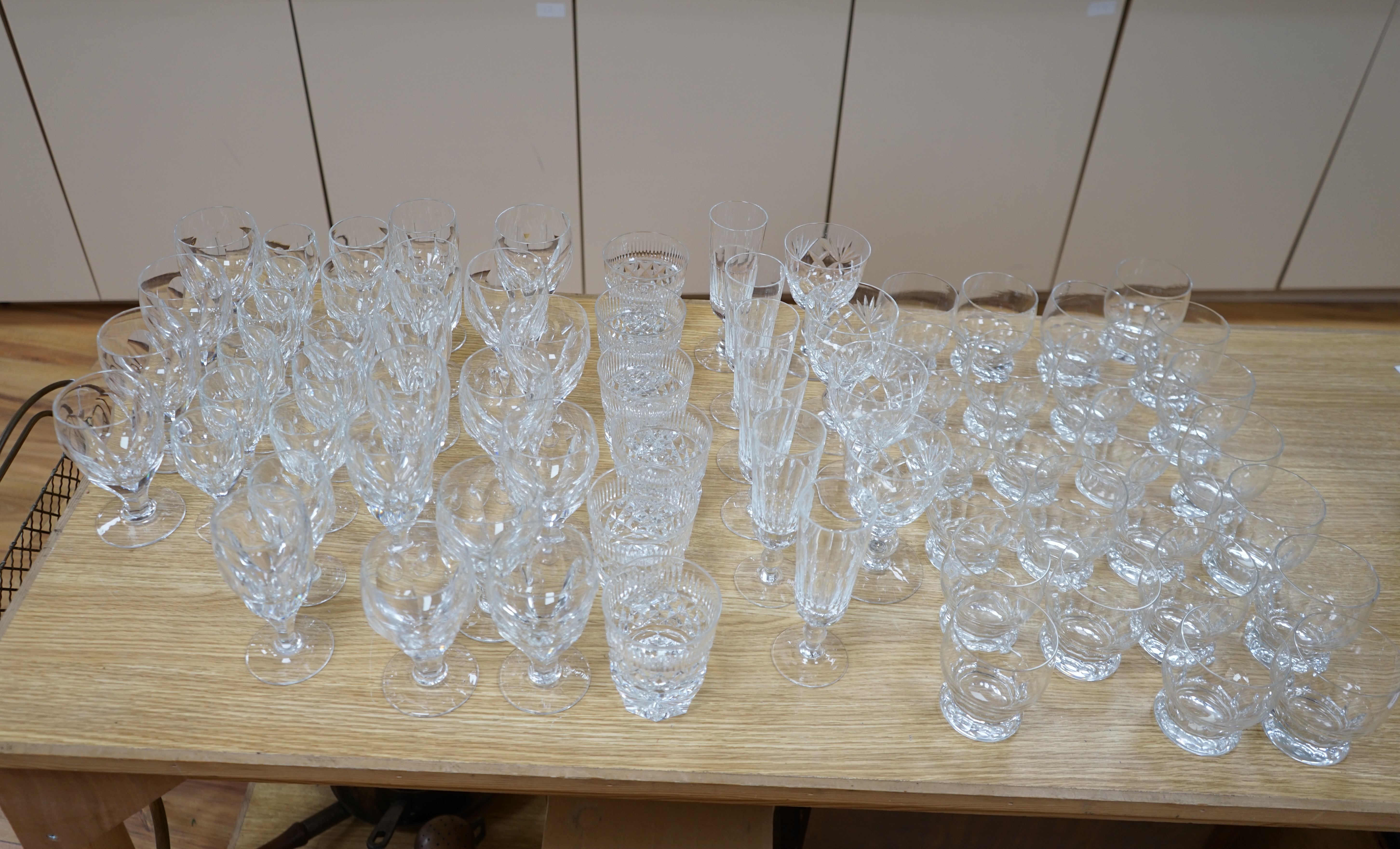 A collection of drinking glasses, including wine glasses, tumblers, champagne flutes, etc. Condition - good.